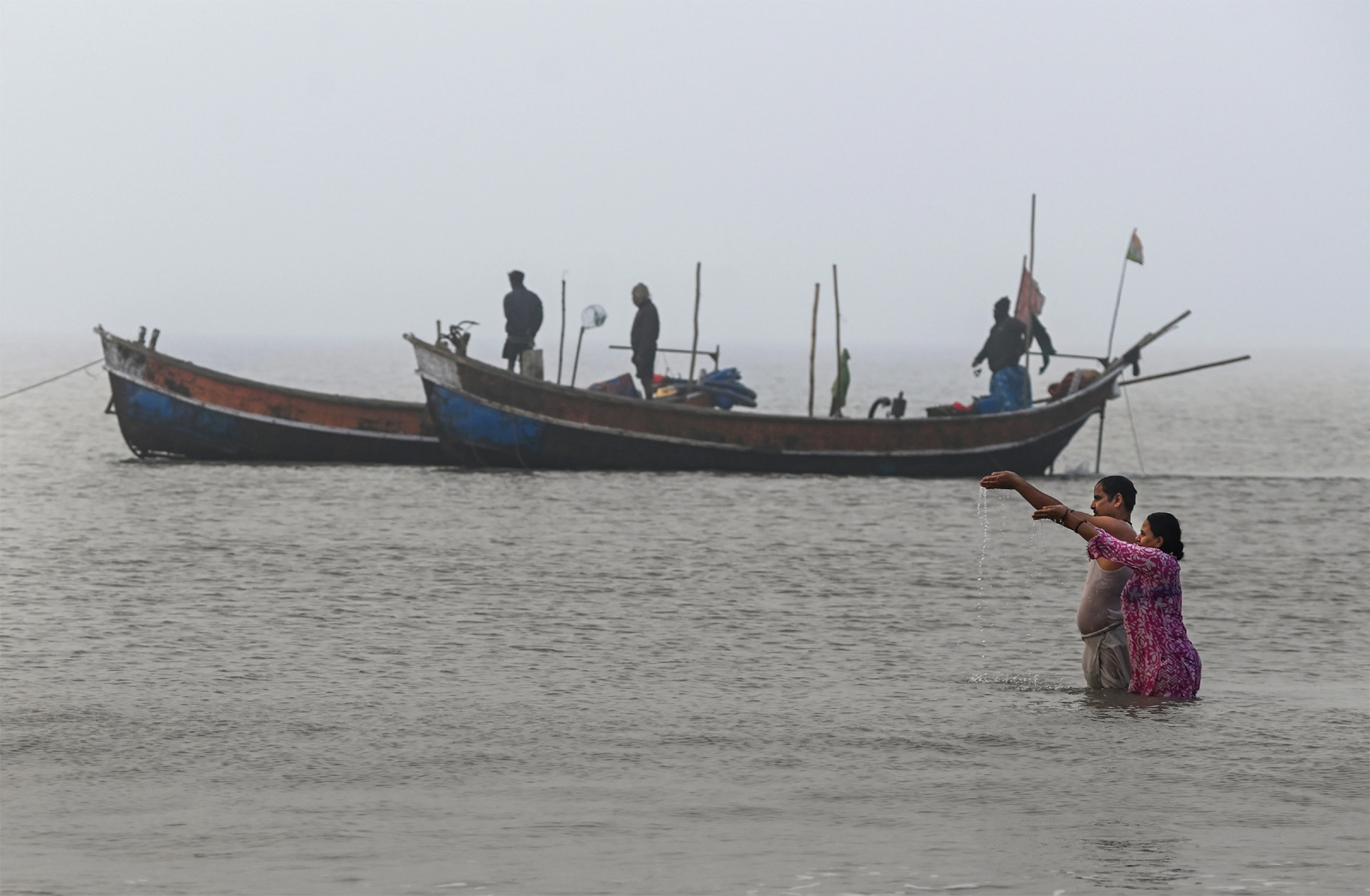 gangasagar mela devotees offer prayer